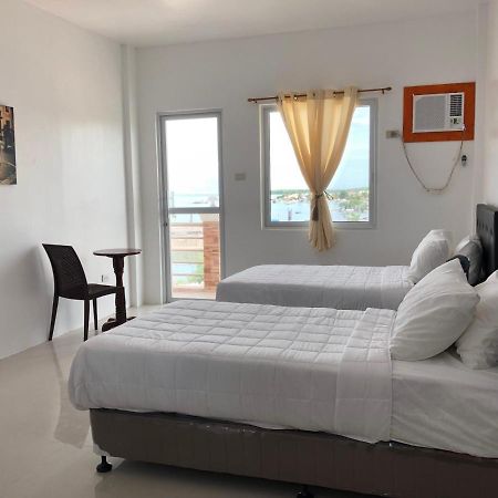 Arriyus Apartelle Daanbantayan Exterior photo