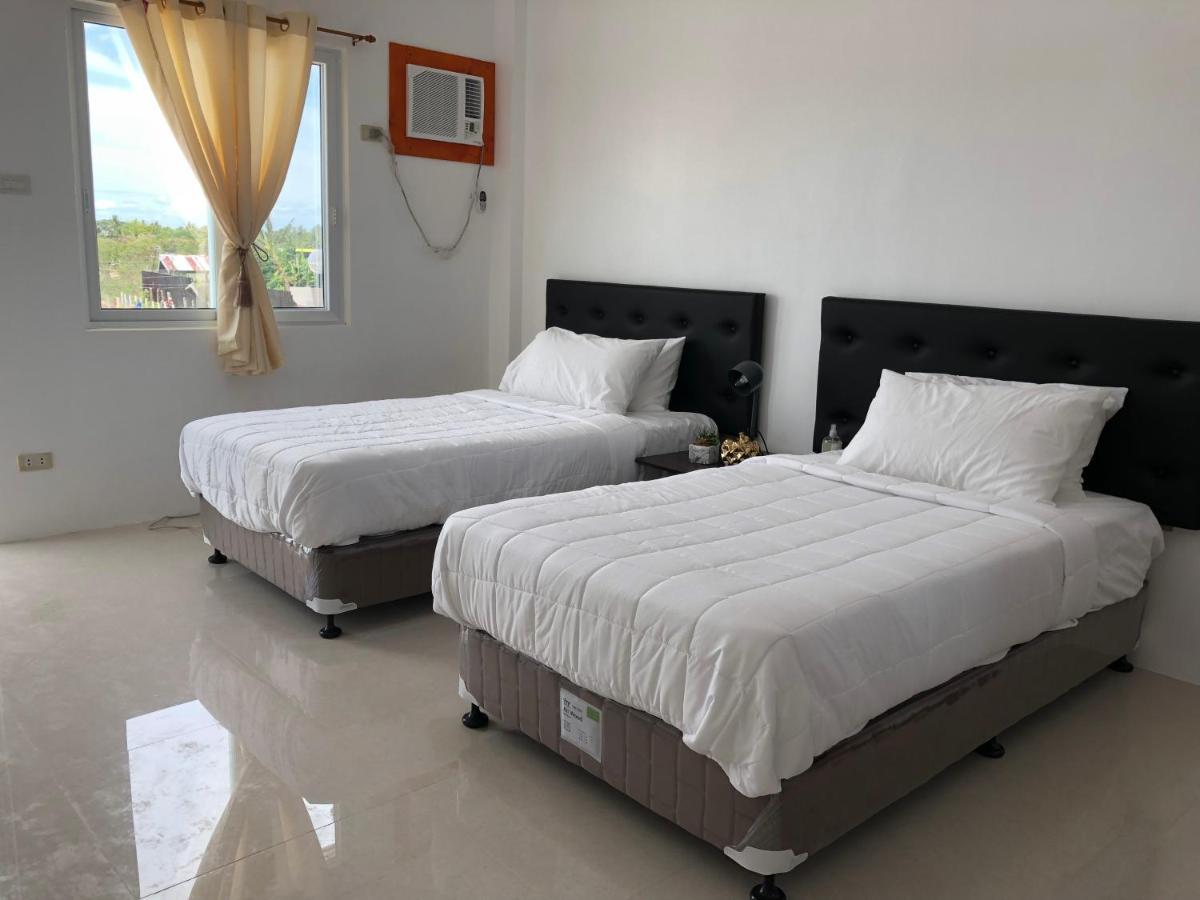 Arriyus Apartelle Daanbantayan Exterior photo