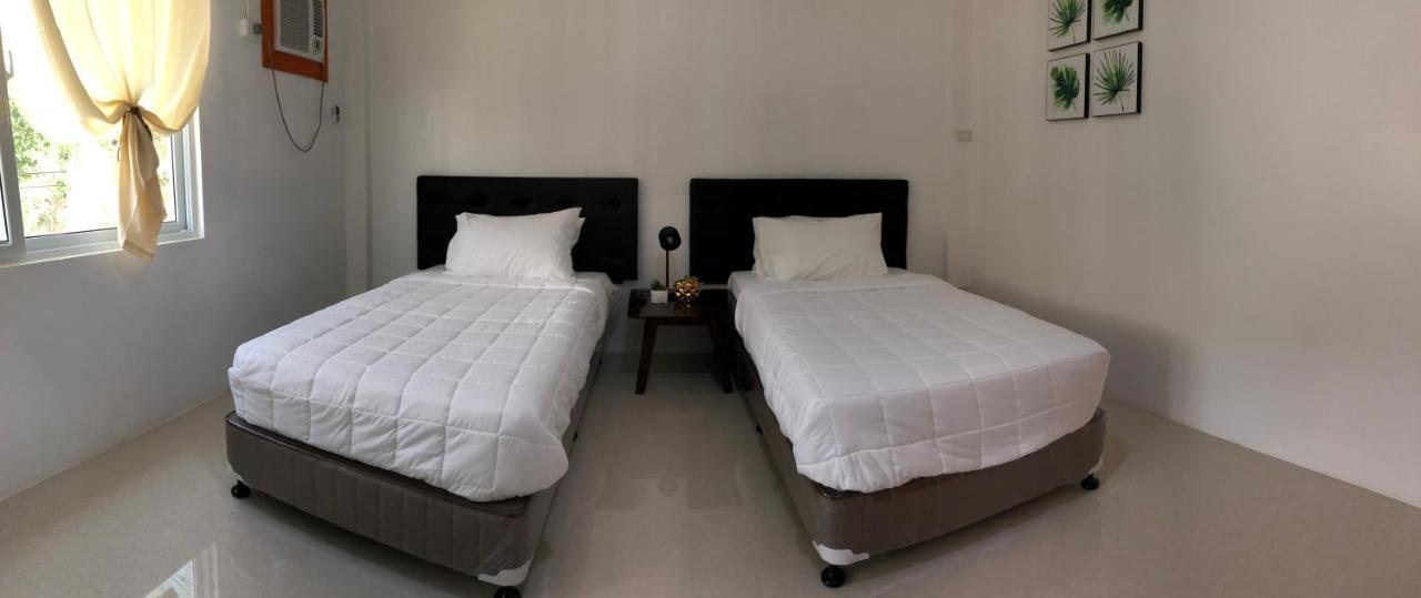 Arriyus Apartelle Daanbantayan Exterior photo