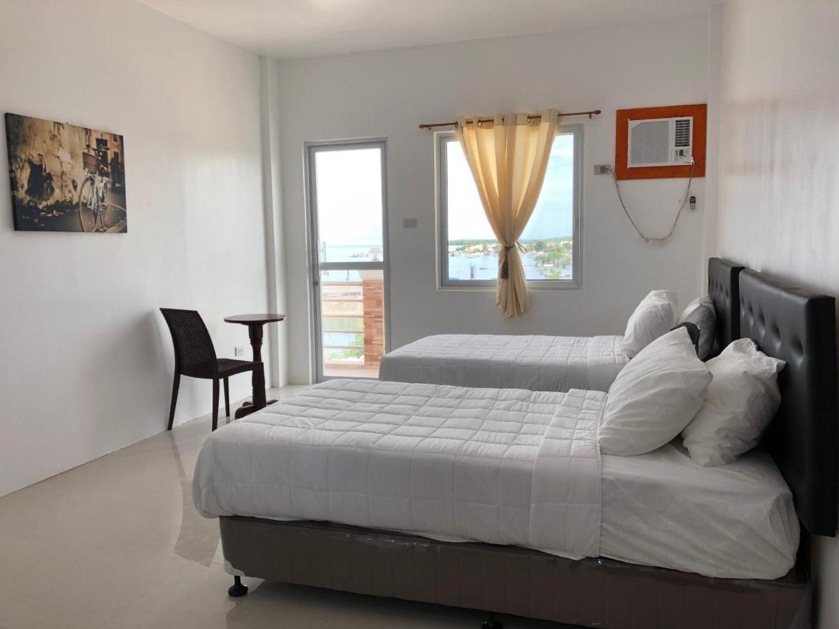 Arriyus Apartelle Daanbantayan Exterior photo
